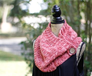 Side view of Clearwater beach buttoned cowl crochet pattern displayed on a mannequin