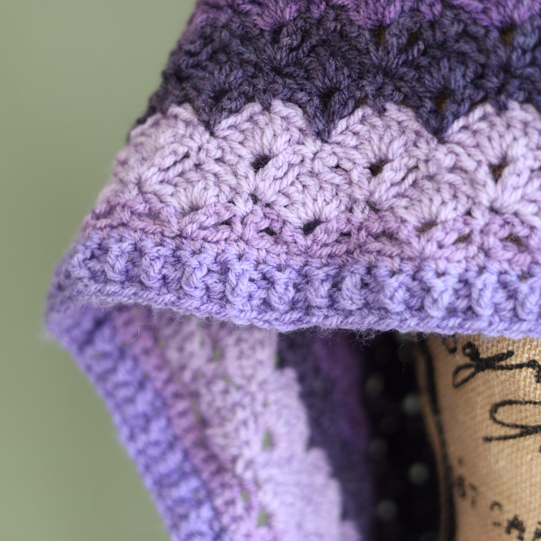 Closeup of the Mermaid Tears Crochet Lace Pattern in purple.