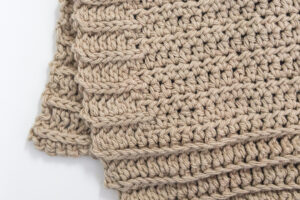 a close up view of the half double crochet ribbing on this crochet dishcloth pattern